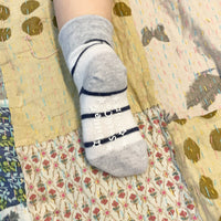 Non-Slip Stay on socks in Navy wide Stripe